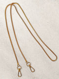 Cadena Metal Escamas Dorada 110 cms.