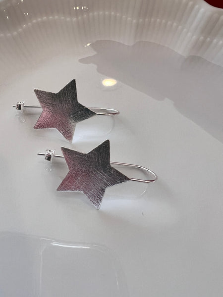 Aros Estrella Radiante Baño de Plata